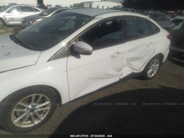 Photo 5 VIN: 1FADP3F21HL202658 - FORD FOCUS 