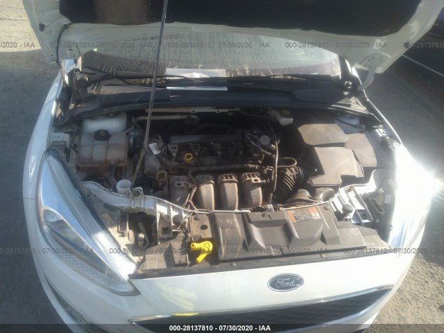 Photo 9 VIN: 1FADP3F21HL202658 - FORD FOCUS 