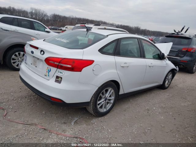 Photo 3 VIN: 1FADP3F21HL327983 - FORD FOCUS 