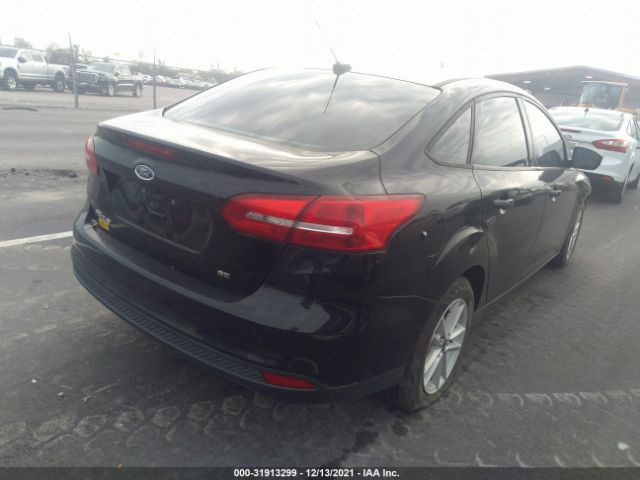 Photo 3 VIN: 1FADP3F21JL201631 - FORD FOCUS 