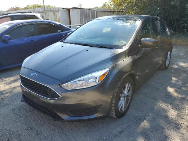 Photo 1 VIN: 1FADP3F21JL202200 - FORD FOCUS SE 