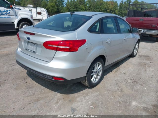 Photo 3 VIN: 1FADP3F21JL202441 - FORD FOCUS 