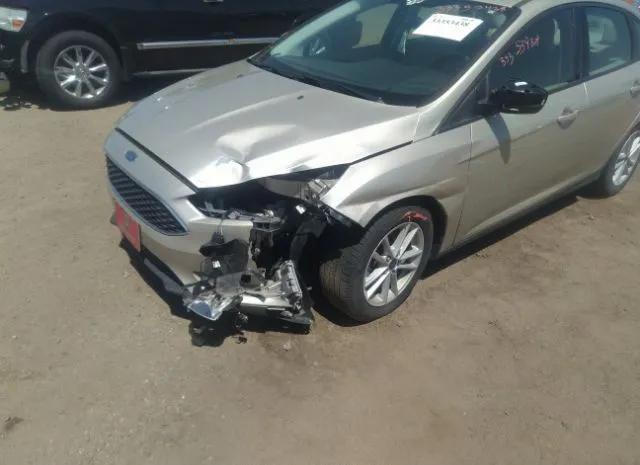 Photo 5 VIN: 1FADP3F21JL206554 - FORD FOCUS 