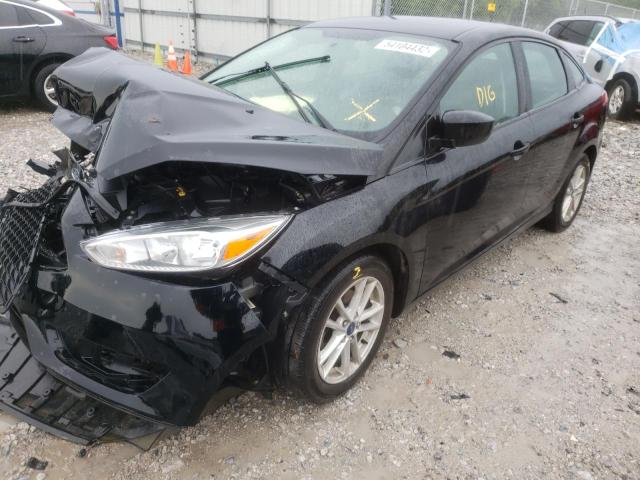 Photo 1 VIN: 1FADP3F21JL207803 - FORD FOCUS SE 