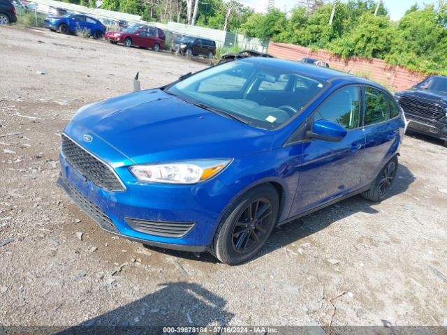 Photo 1 VIN: 1FADP3F21JL212371 - FORD FOCUS 