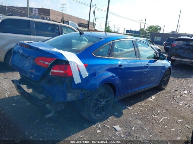 Photo 3 VIN: 1FADP3F21JL212371 - FORD FOCUS 