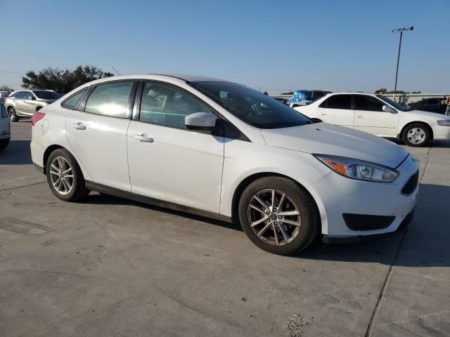 Photo 3 VIN: 1FADP3F21JL216758 - FORD FOCUS SE 