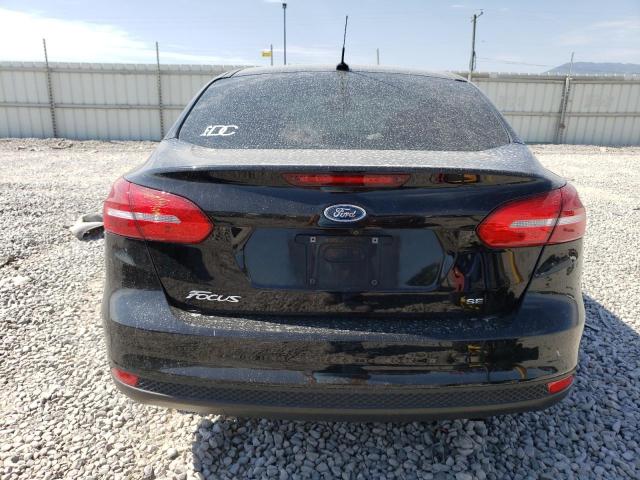 Photo 5 VIN: 1FADP3F21JL217070 - FORD FOCUS SE 