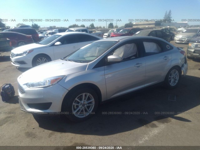 Photo 1 VIN: 1FADP3F21JL249484 - FORD FOCUS 