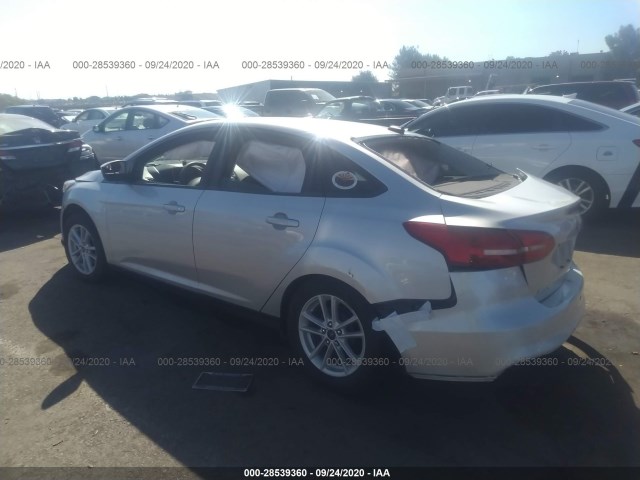 Photo 2 VIN: 1FADP3F21JL249484 - FORD FOCUS 