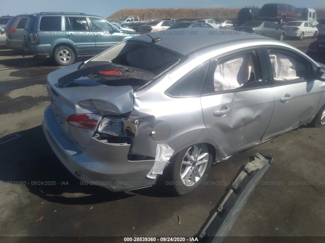 Photo 5 VIN: 1FADP3F21JL249484 - FORD FOCUS 