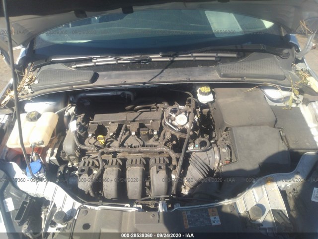 Photo 9 VIN: 1FADP3F21JL249484 - FORD FOCUS 