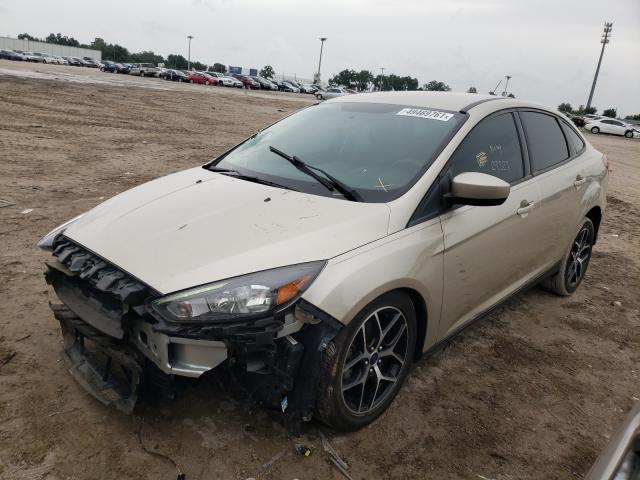 Photo 1 VIN: 1FADP3F21JL256659 - FORD FOCUS 