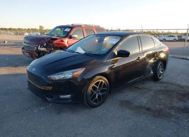 Photo 1 VIN: 1FADP3F21JL265636 - FORD FOCUS 