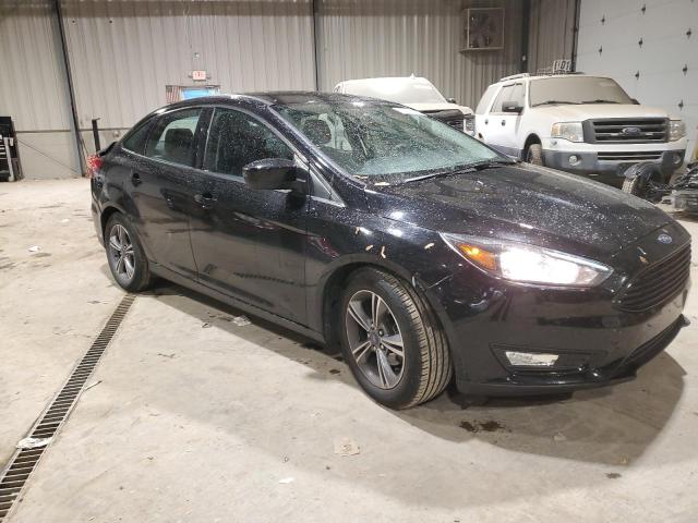 Photo 3 VIN: 1FADP3F21JL267385 - FORD FOCUS 