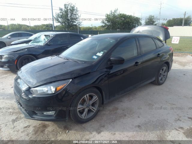 Photo 1 VIN: 1FADP3F21JL269329 - FORD FOCUS 