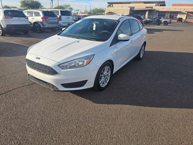 Photo 1 VIN: 1FADP3F21JL286180 - FORD FOCUS SE 