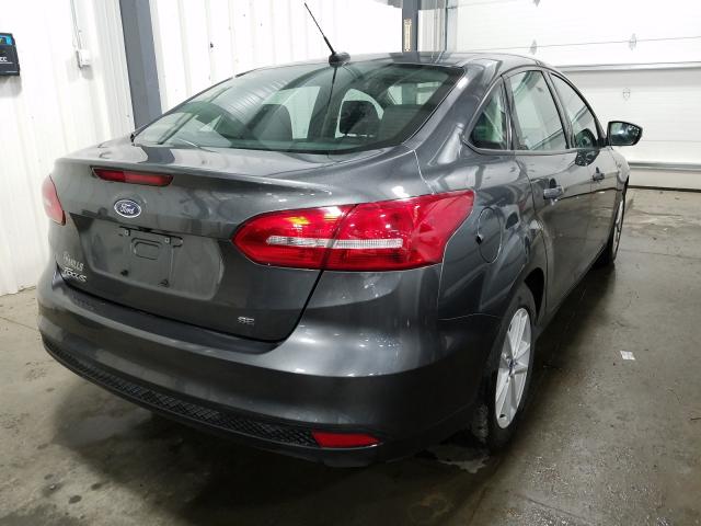 Photo 3 VIN: 1FADP3F21JL303690 - FORD FOCUS SE 