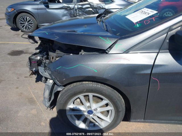 Photo 5 VIN: 1FADP3F21JL312566 - FORD FOCUS 