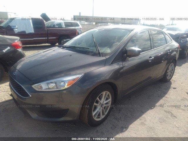 Photo 1 VIN: 1FADP3F21JL319730 - FORD FOCUS 