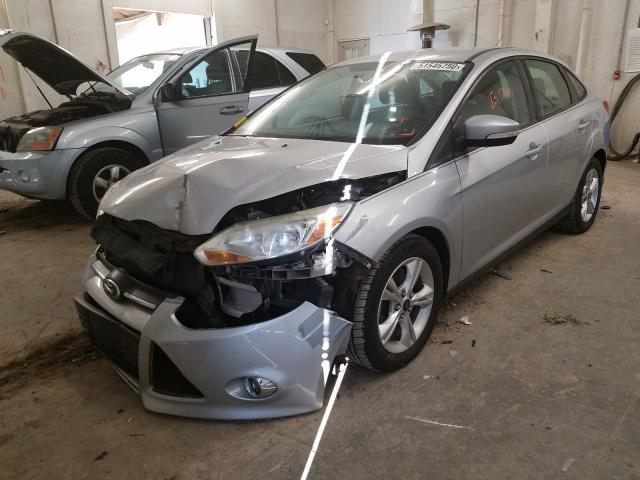 Photo 1 VIN: 1FADP3F22DL112591 - FORD FOCUS SE 