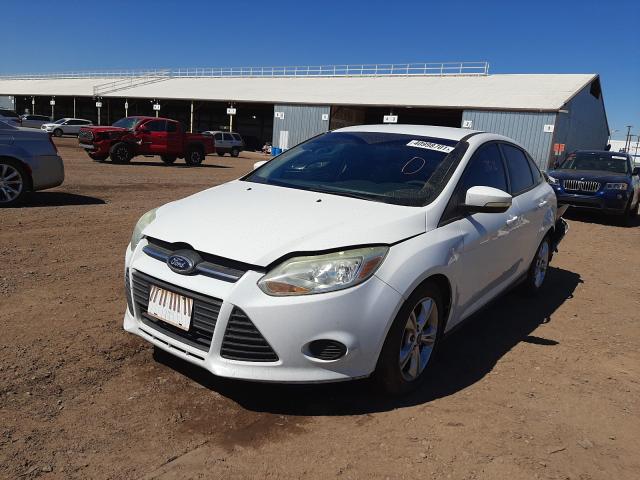 Photo 1 VIN: 1FADP3F22DL212657 - FORD FOCUS SE 