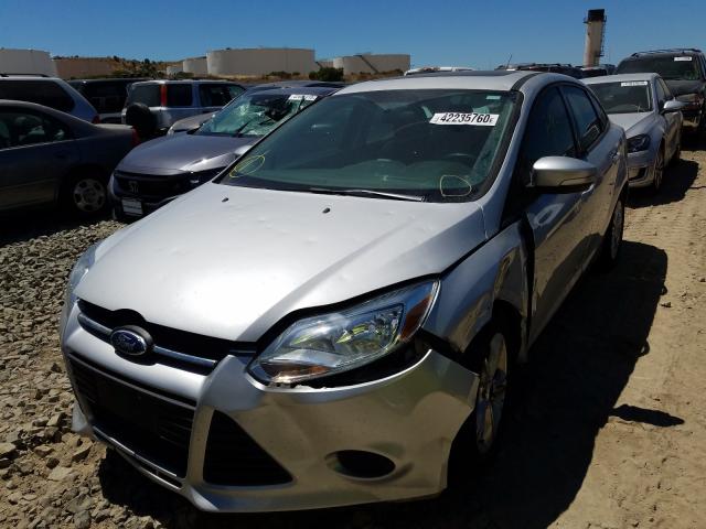 Photo 1 VIN: 1FADP3F22DL291358 - FORD FOCUS SE 