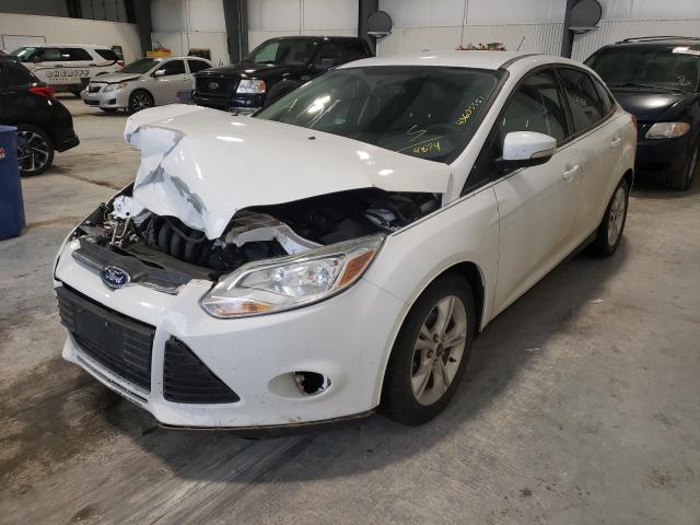 Photo 1 VIN: 1FADP3F22DL294874 - FORD FOCUS SE 