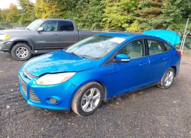 Photo 1 VIN: 1FADP3F22DL300561 - FORD FOCUS 