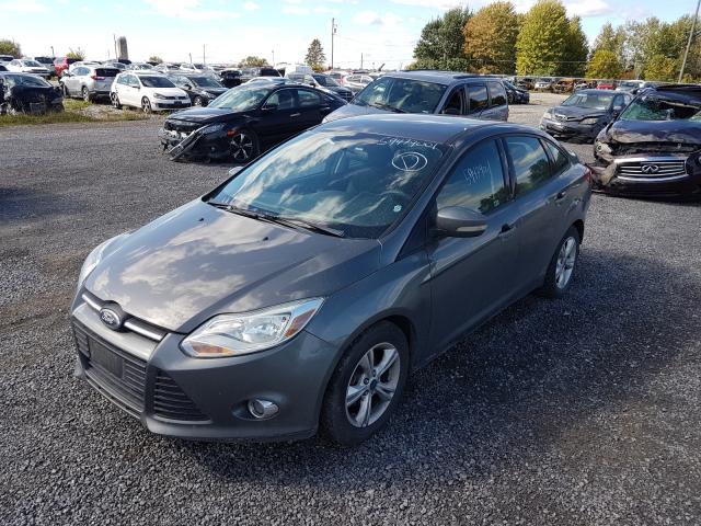 Photo 1 VIN: 1FADP3F22DL328344 - FORD FOCUS SE 