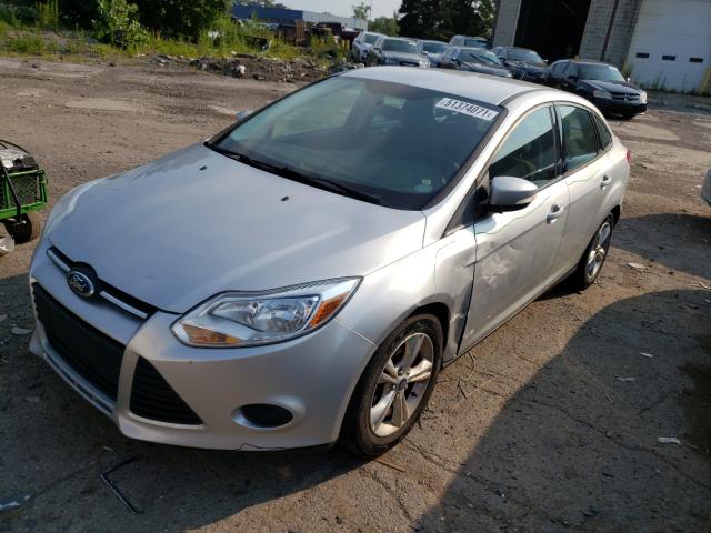 Photo 1 VIN: 1FADP3F22DL351073 - FORD FOCUS SE 