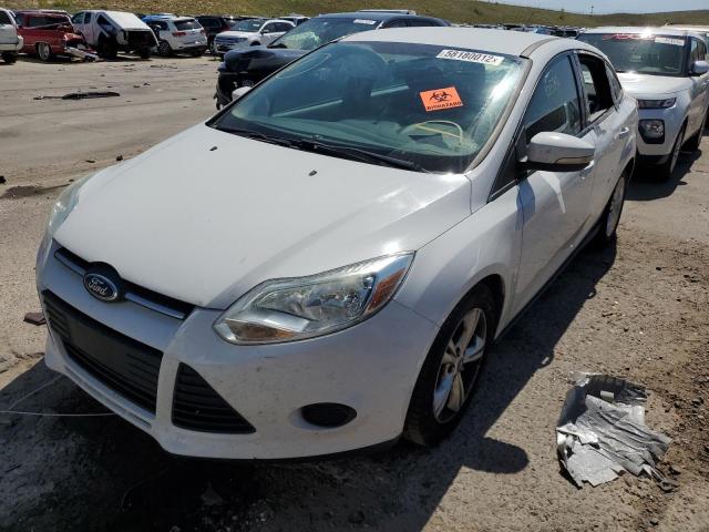 Photo 1 VIN: 1FADP3F22DL381688 - FORD FOCUS SE 