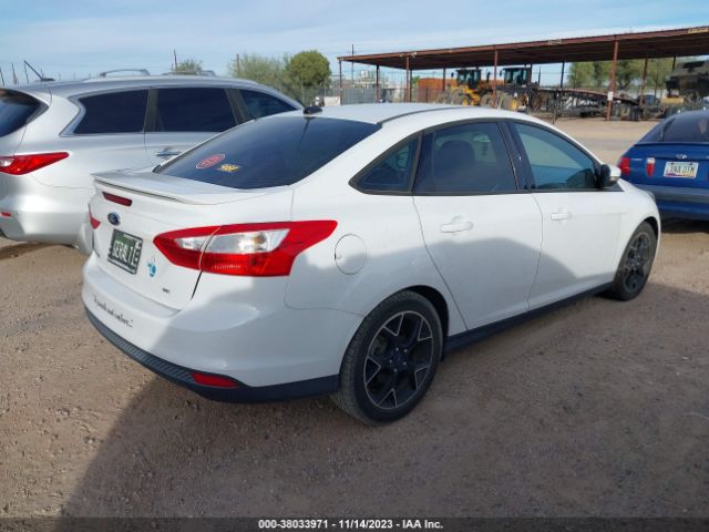 Photo 3 VIN: 1FADP3F22DL384252 - FORD FOCUS 