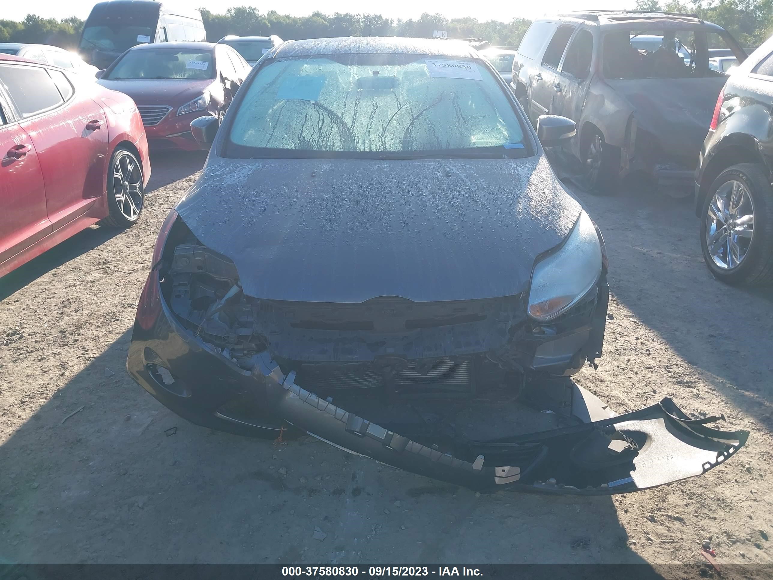 Photo 12 VIN: 1FADP3F22EL105853 - FORD FOCUS 