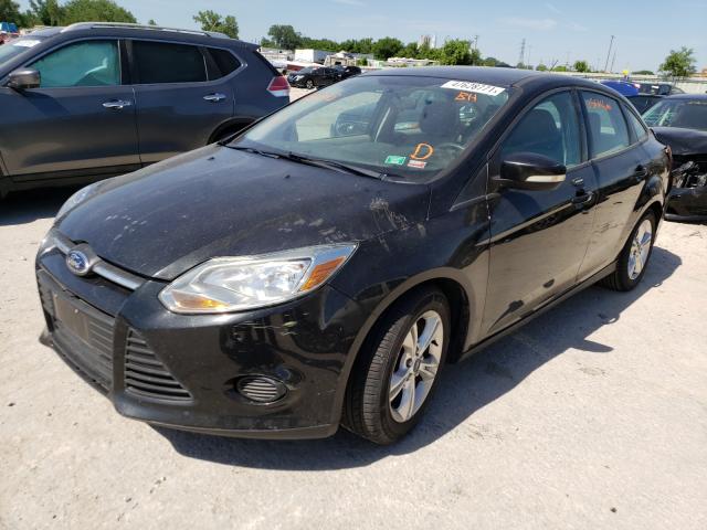 Photo 1 VIN: 1FADP3F22EL135323 - FORD FOCUS SE 