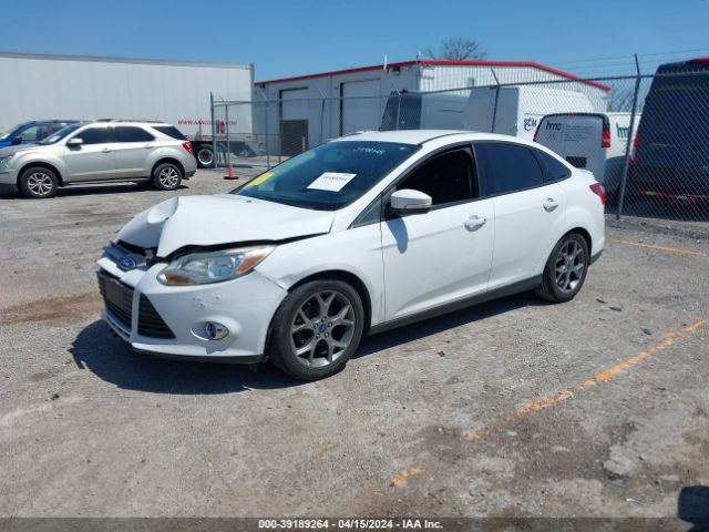 Photo 1 VIN: 1FADP3F22EL163901 - FORD FOCUS 