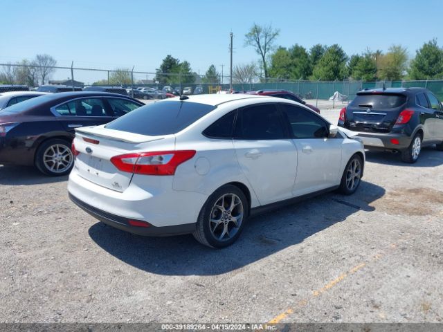 Photo 3 VIN: 1FADP3F22EL163901 - FORD FOCUS 