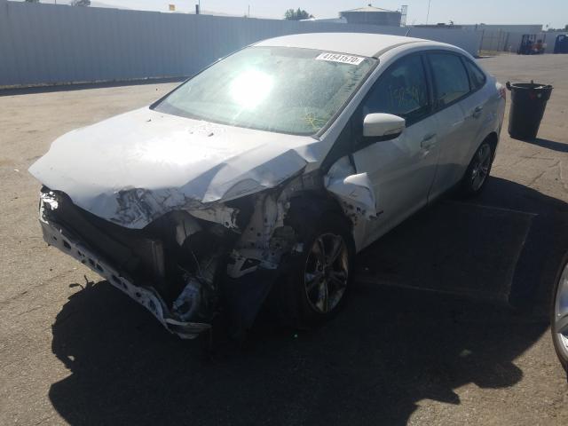 Photo 1 VIN: 1FADP3F22EL220274 - FORD FOCUS SE 