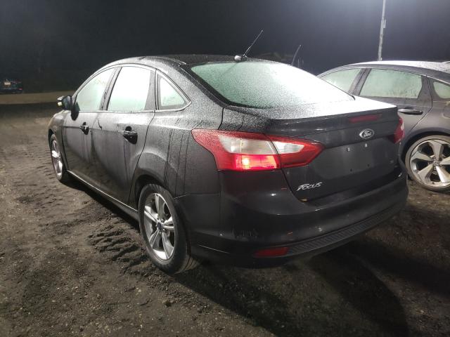 Photo 2 VIN: 1FADP3F22EL285190 - FORD FOCUS SE 