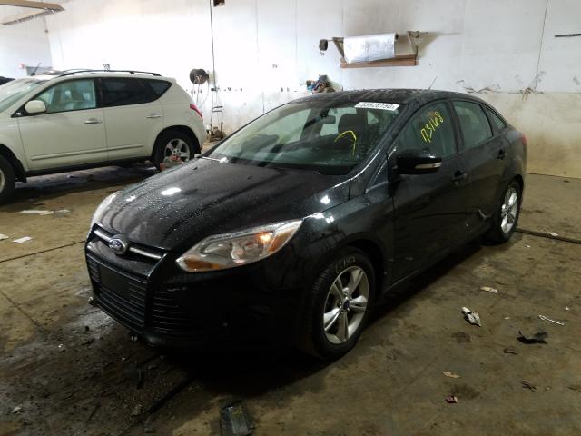 Photo 1 VIN: 1FADP3F22EL427490 - FORD FOCUS SE 