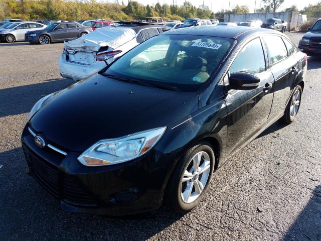 Photo 1 VIN: 1FADP3F22EL437615 - FORD FOCUS SE 