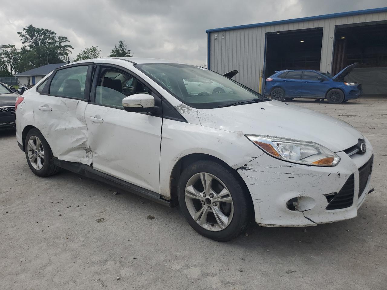 Photo 3 VIN: 1FADP3F22EL447738 - FORD FOCUS 