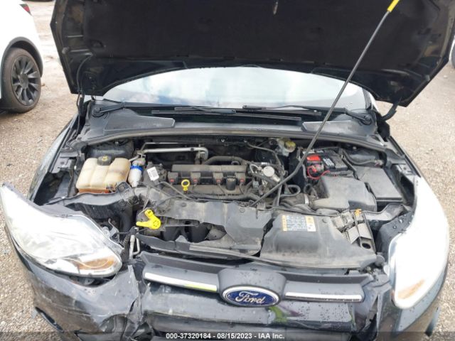 Photo 9 VIN: 1FADP3F22EL457038 - FORD FOCUS 