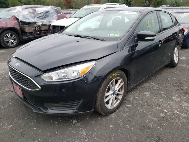 Photo 1 VIN: 1FADP3F22FL237612 - FORD FOCUS SE 