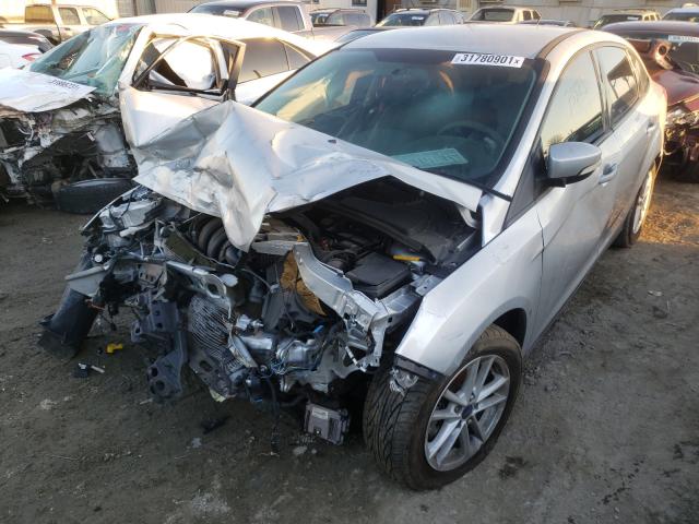 Photo 1 VIN: 1FADP3F22FL288267 - FORD FOCUS SE 