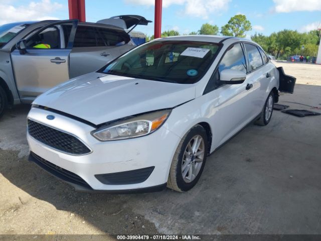 Photo 1 VIN: 1FADP3F22GL203963 - FORD FOCUS 