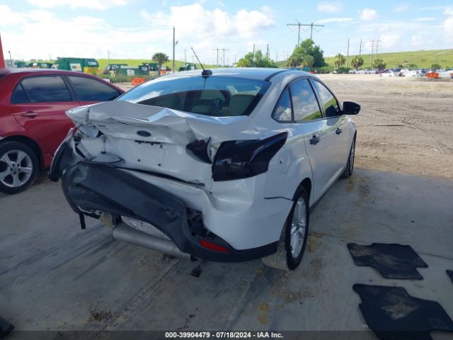 Photo 3 VIN: 1FADP3F22GL203963 - FORD FOCUS 