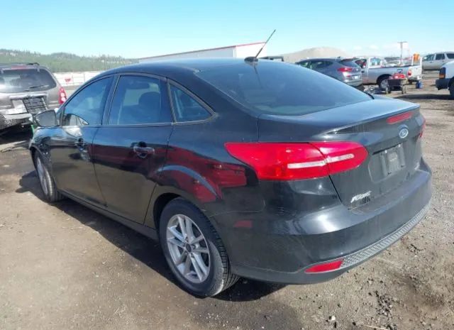 Photo 2 VIN: 1FADP3F22GL204031 - FORD FOCUS 