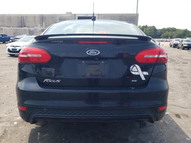 Photo 5 VIN: 1FADP3F22GL206765 - FORD FOCUS 