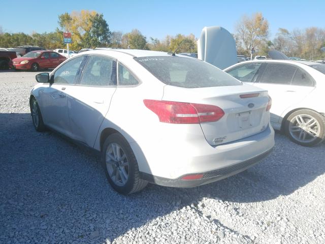 Photo 2 VIN: 1FADP3F22GL208905 - FORD FOCUS 